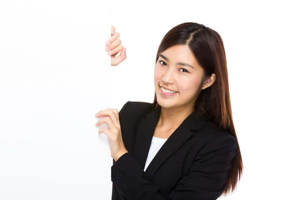 Businesswoman holding blank board — Stock Photo, Image