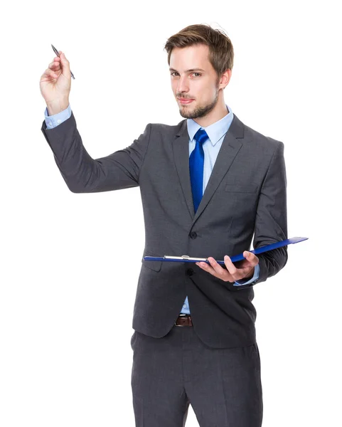 Businessman write on clipboard — Stock Photo, Image