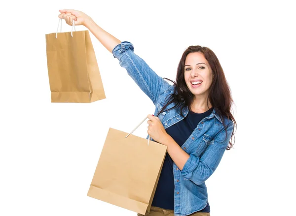 Mulher segurando sacos de compras — Fotografia de Stock