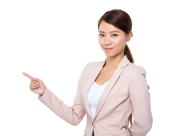 Mujer de negocios con el dedo a un lado — Foto de Stock
