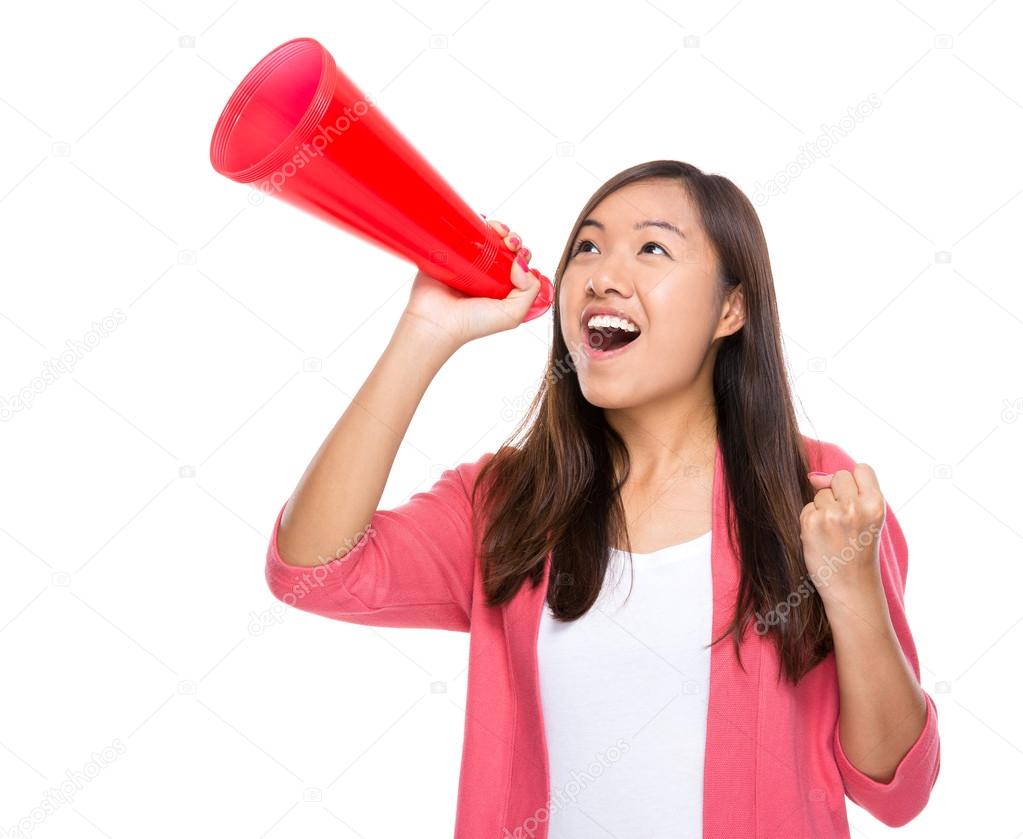 Woman shouting with megaphone