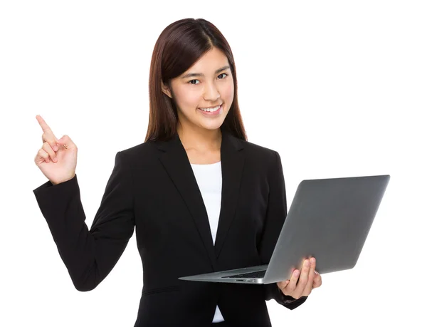 Businesswoman with laptop and finger up — Stock Photo, Image