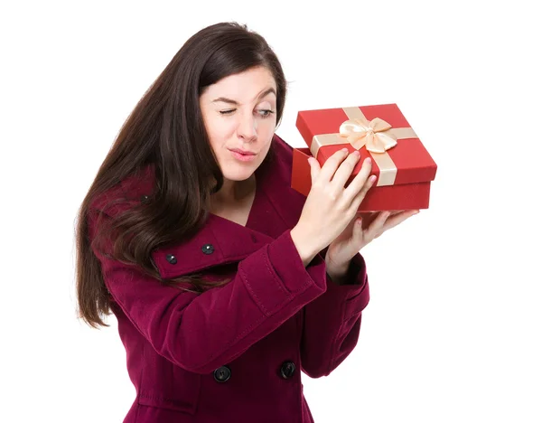 Woman looking at gift box — Stock Photo, Image