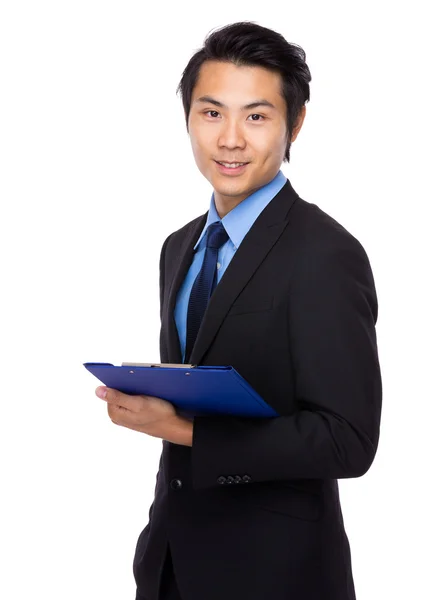 Businessman with clipboard — Stock Photo, Image