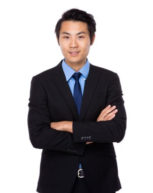 kollarını çapraz yakışıklı işadamı