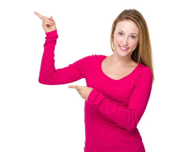 Woman with two finger point aside — Stock Photo, Image