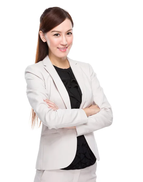 Young businesswoman with arms crossed — Stock Photo, Image