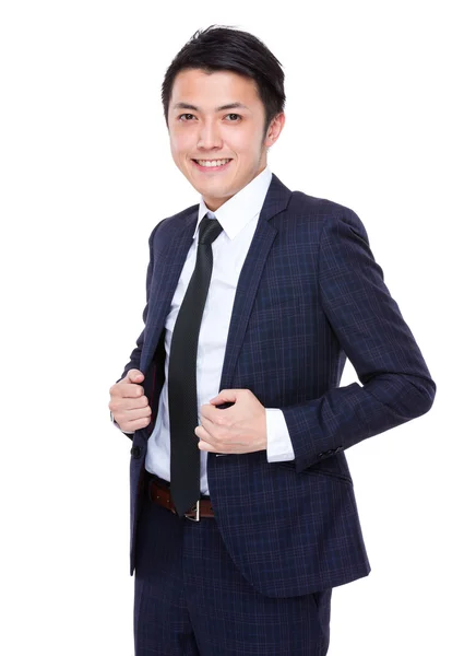 Businessman holding his collar — Stock Photo, Image