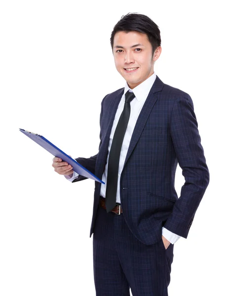 Businessman with clipboard — Stock Photo, Image