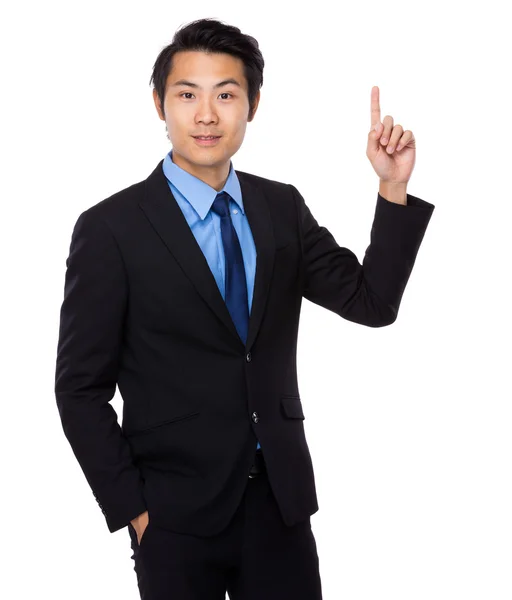 Бизнесмен с поднятым пальцем — стоковое фото