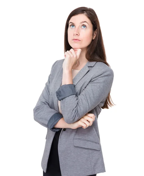 Businesswoman thinking of idea — Stock Photo, Image