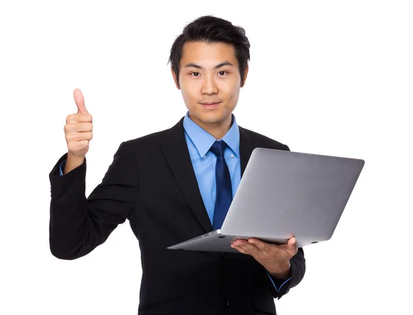 Businessman with laptop and thumb up — Stock Photo, Image