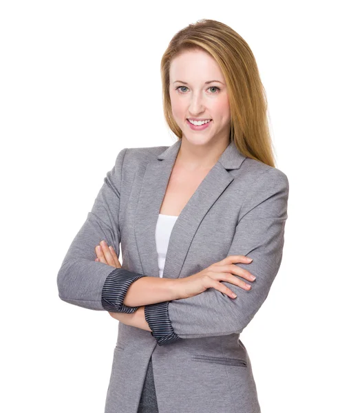 Young businesswoman with arms crossed — Stock Photo, Image