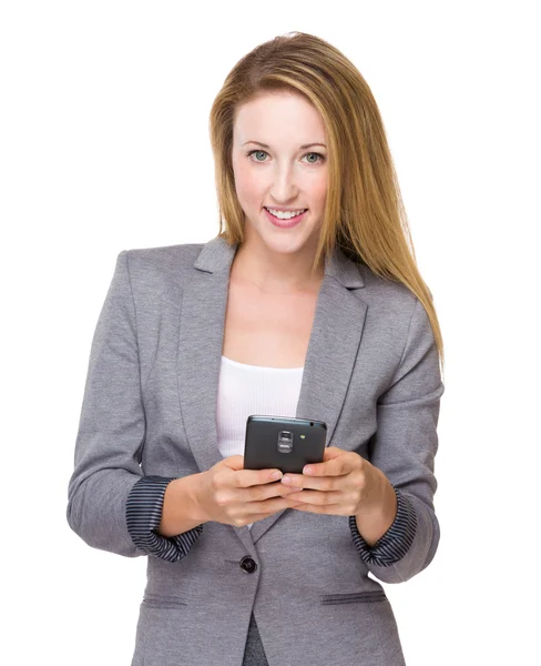 Businesswoman using cellphone — Stock Photo, Image