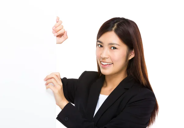 Businesswoman with white billboard — Stock Photo, Image