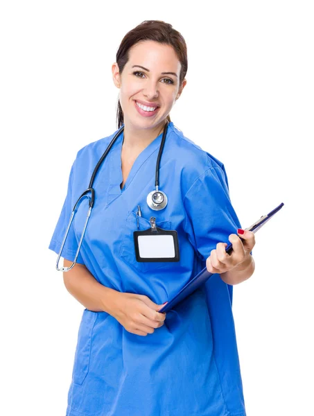 Female doctor with clipboard — Stock Photo, Image