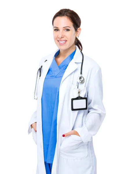 Female doctor with hands in pockets — Stock Photo, Image