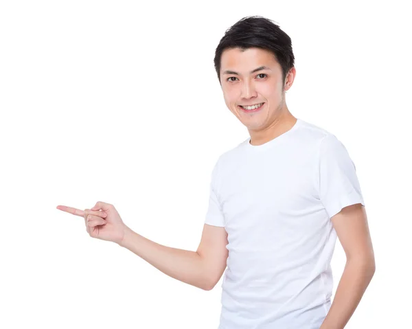 Junger Mann mit erhobenem Zeigefinger — Stockfoto
