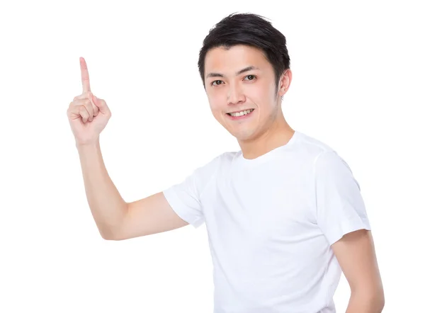 Молодой человек с поднятым пальцем — стоковое фото