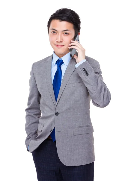 Businessman talking on cellphone — Stock Photo, Image