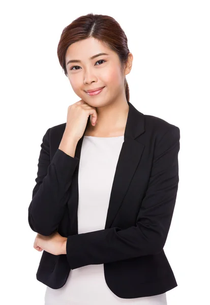 Businesswoman with hand touching her chin — Stock Photo, Image