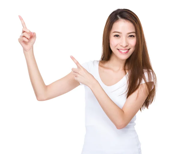 Kvinna med två fingrar pekar upp — Stockfoto