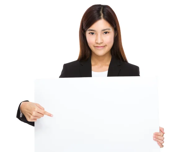Businesswoman with finger point to white board — Stock Photo, Image