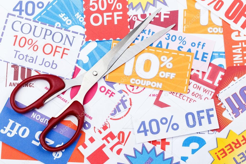 Money saving coupon vouchers with scissors