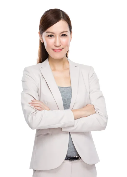 Confident businesswoman with arms crossed — Stock Photo, Image