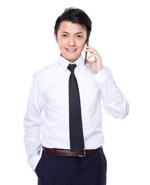 Businessman talking on mobile phone — Stock Photo, Image