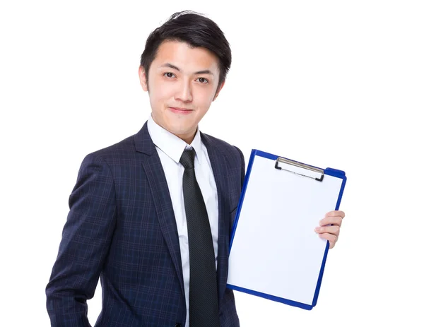 Businessman with blank paper on clipboard — Stock Photo, Image