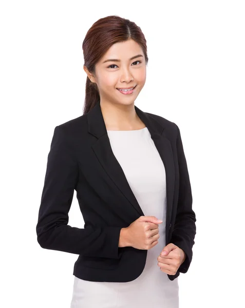 Businesswoman with hands on collar — Stock Photo, Image