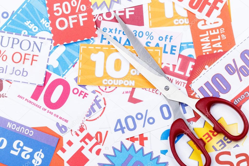 Discount coupons with scissors