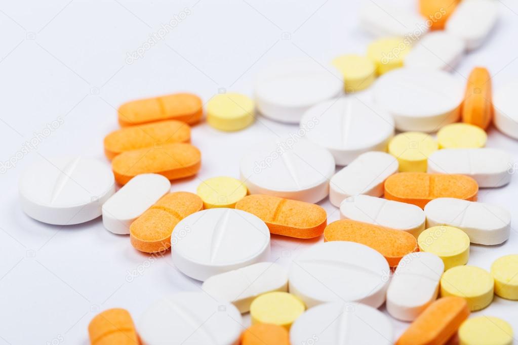 Medical pills on table