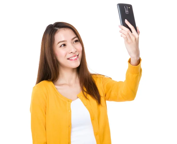 Woman taking selfie with smartphone — Stock Photo, Image