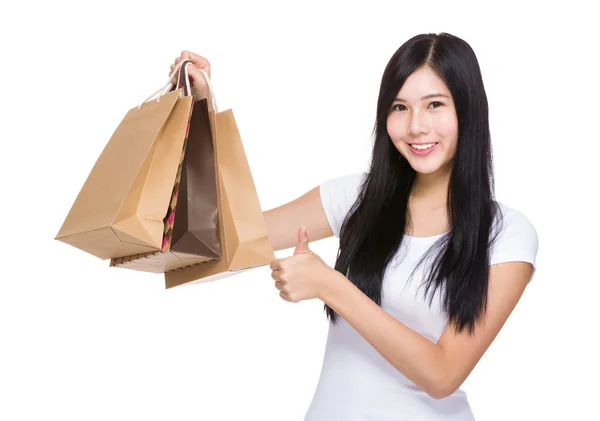 Mujer de compras con el pulgar hacia arriba —  Fotos de Stock