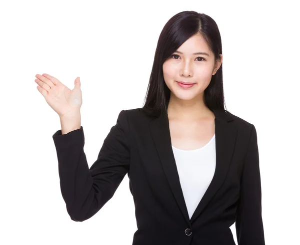 Businesswoman giving hand presentation — Stock Photo, Image