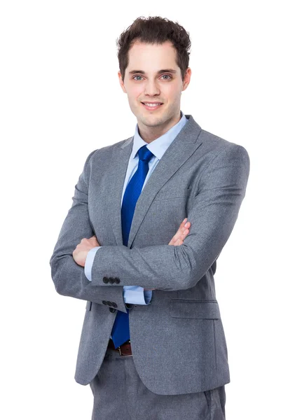 Businessman with arms crossed Stock Picture