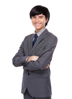 Kolları çapraz iş adamı