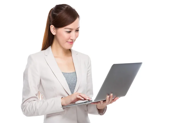 Businesswoman using laptop computer — Stock Photo, Image