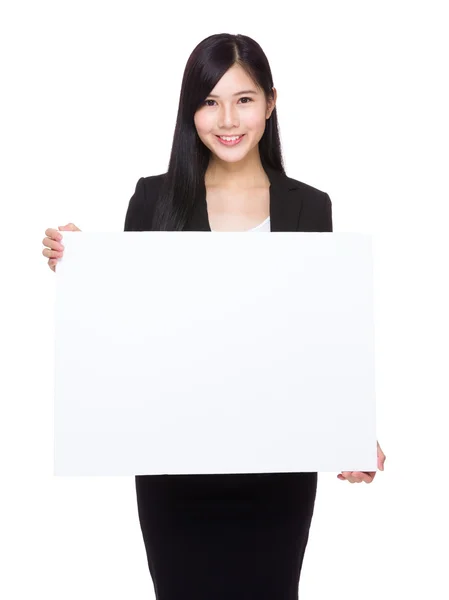 Businesswoman with white card board — Stock Photo, Image