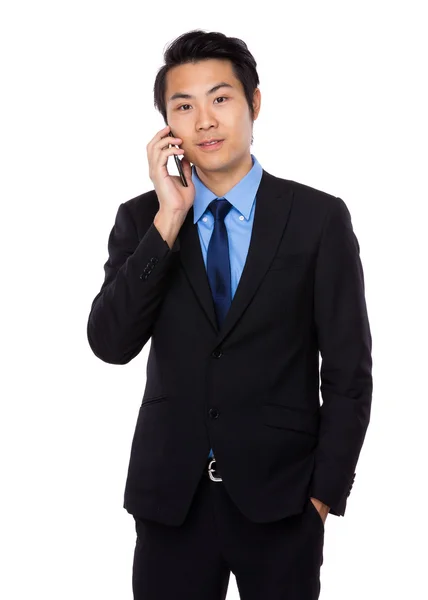 Businessman talking on mobile phone — Stock Photo, Image