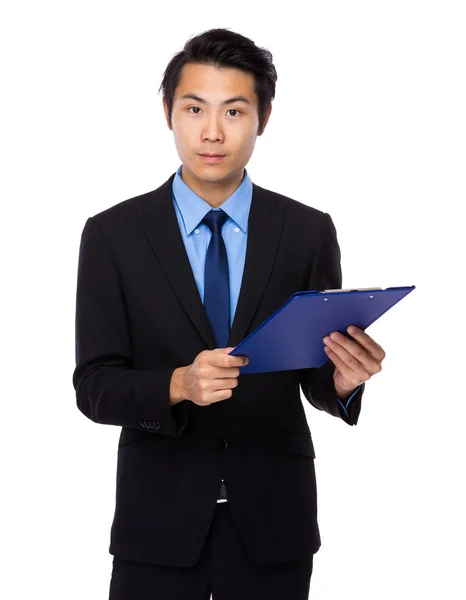 Businessman with clipboard — Stock Photo, Image