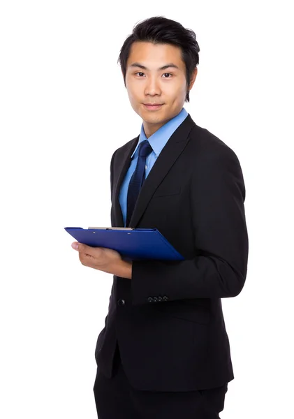 Businessman with clipboard — Stock Photo, Image