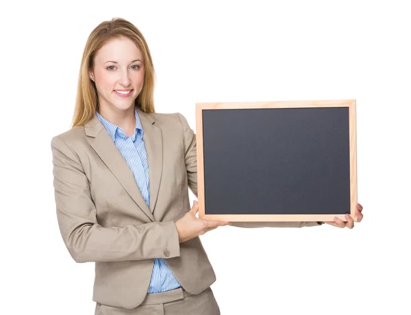 Businesswoman with black board — Stock Photo, Image