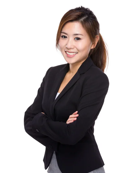 Young businesswoman with arms crossed — Stock Photo, Image