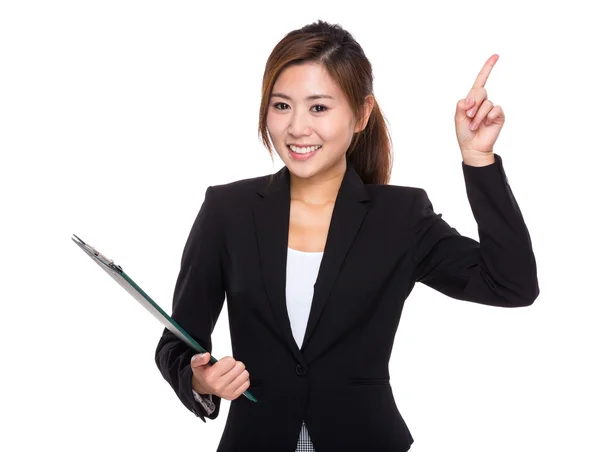 Businesswoman with clipboard and finger up — Stock Photo, Image