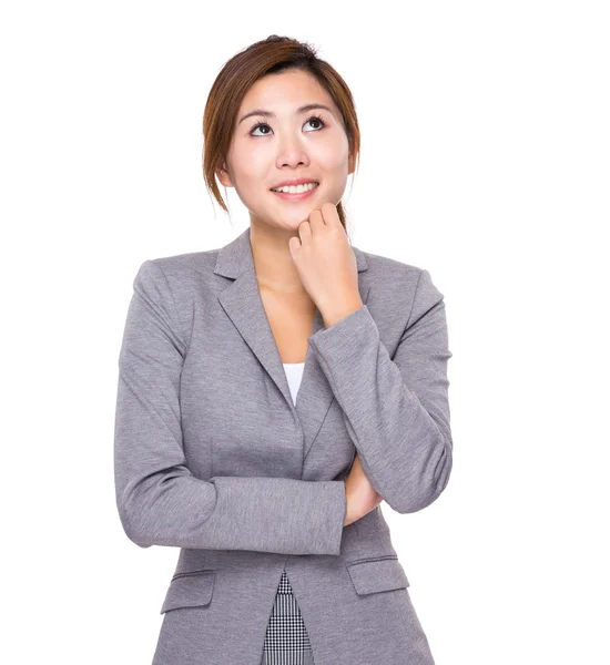 Businesswoman thinking of idea — Stock Photo, Image