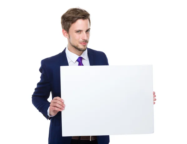 Бізнесмен з білим плакатом — стокове фото