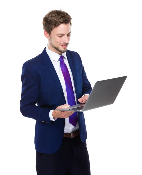 Businessman using laptop computer — Stock Photo, Image